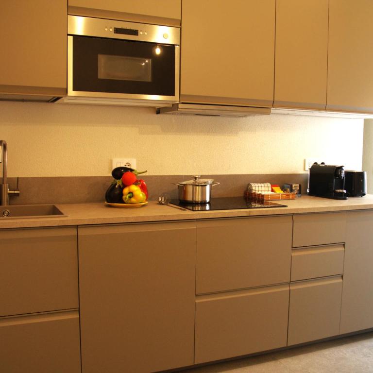 Liana Guesthouse Milò - Appartamento Deluxe con 2 Camere da Letto e Balcone - 12