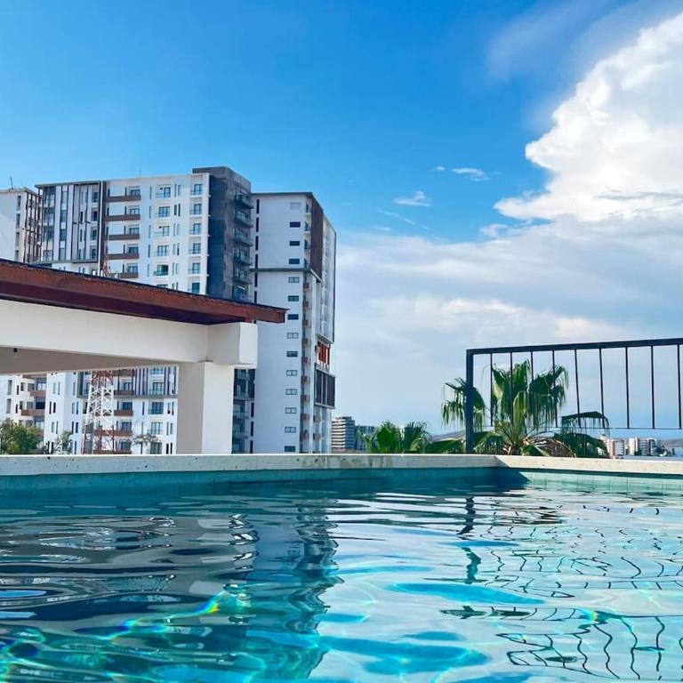 450 m a playa, alberca y estacionamiento - Apartamento de 2 dormitorios con balcón - 13