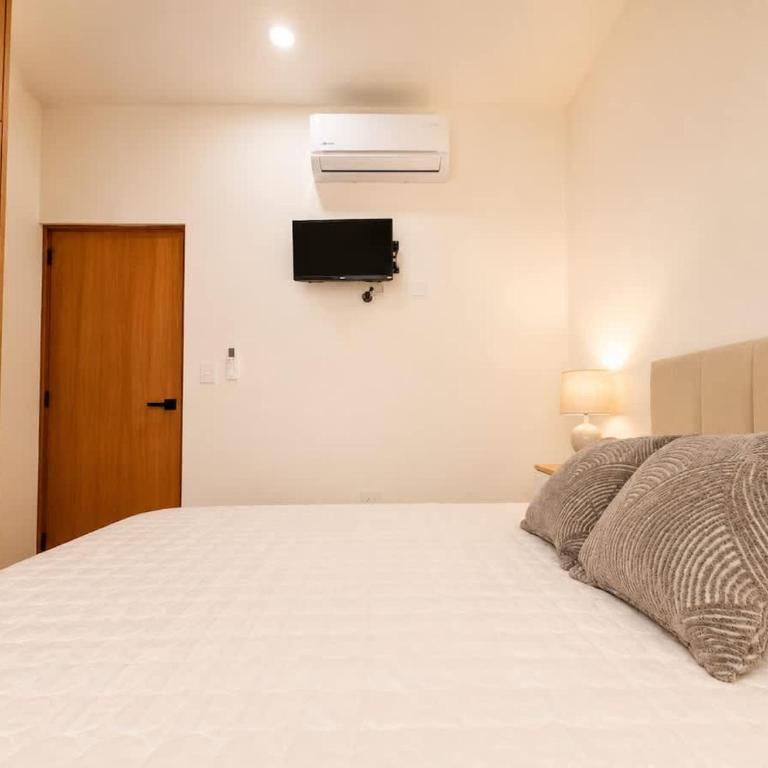 450 m a playa, alberca y estacionamiento - Apartamento de 2 dormitorios con balcón - 11
