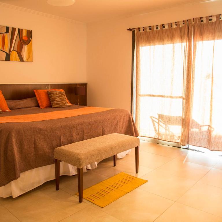 Colinas de Nono - Suite con cama grande y vistas a la piscina - 11