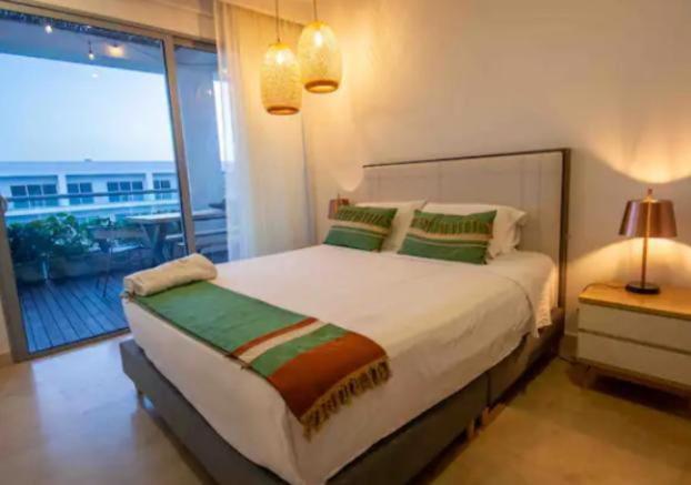 Apartamento con vista al mar, salida a la playa, aire acondicionado y jacuzzi - Apartment - 11
