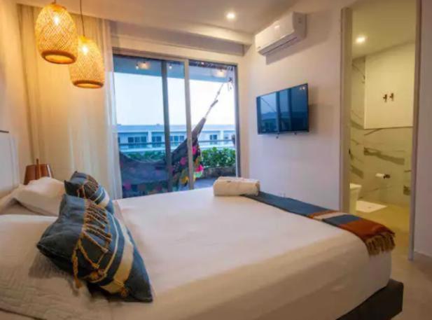 Apartamento con vista al mar, salida a la playa, aire acondicionado y jacuzzi - Apartment - 16