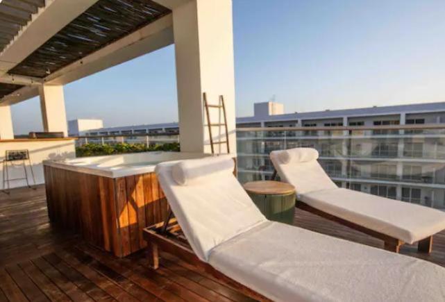 Apartamento con vista al mar, salida a la playa, aire acondicionado y jacuzzi - Apartment - 18