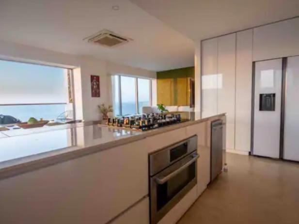 Apartamento con vista al mar, salida a la playa, aire acondicionado y jacuzzi - Apartment - 23