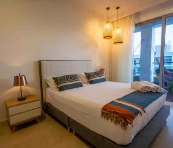 Apartamento con vista al mar, salida a la playa, aire acondicionado y jacuzzi - Apartment - 29