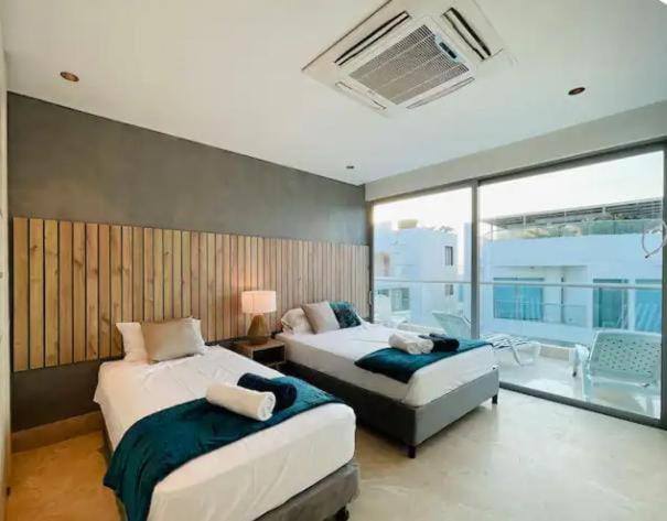 Apartamento con piscina, Morros Cartagena vista al mar y aire acondicionado 3 habitaciones - Three-Bedroom Apartment - 15