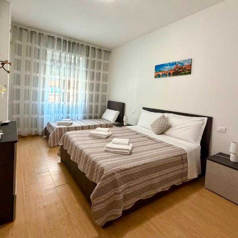 Casa Vacanza da ELENA 3 - Bilocale in prossimità della Stazione FS Verona Porta Nuova - Appartamento con 2 Camere da Letto e Balcone - 2