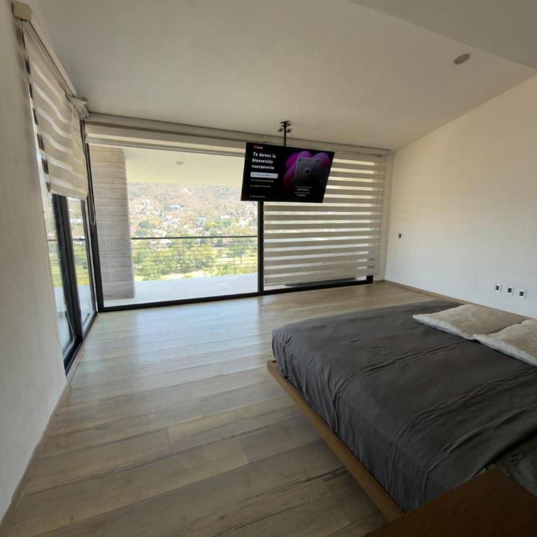 Casa estilo cabaña con alberca infinita climatizada - Four-Bedroom House - 6