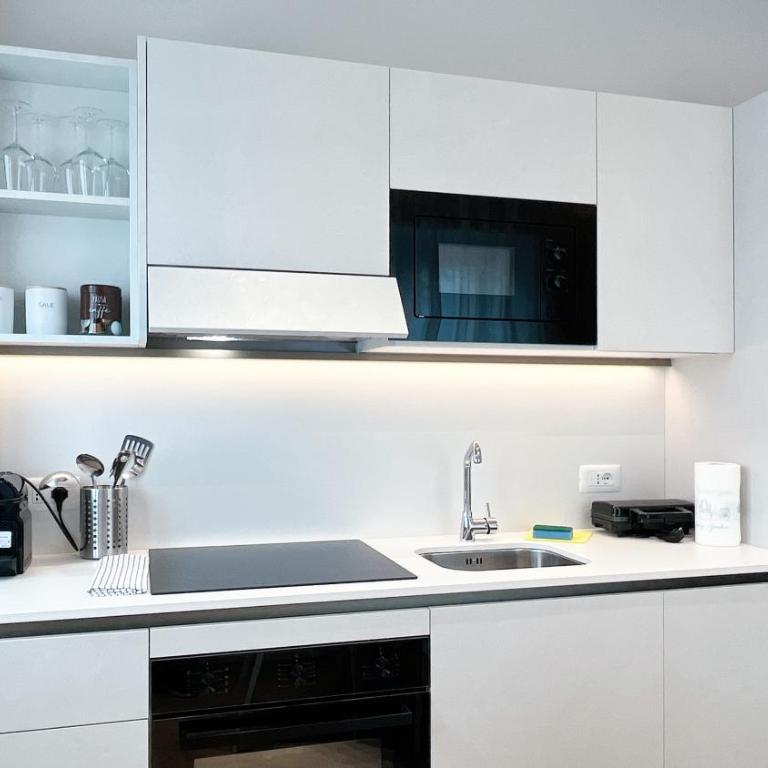 G Holiday - Appartamento con 1 Camera da Letto, Balcone e Vista Montagna - 11