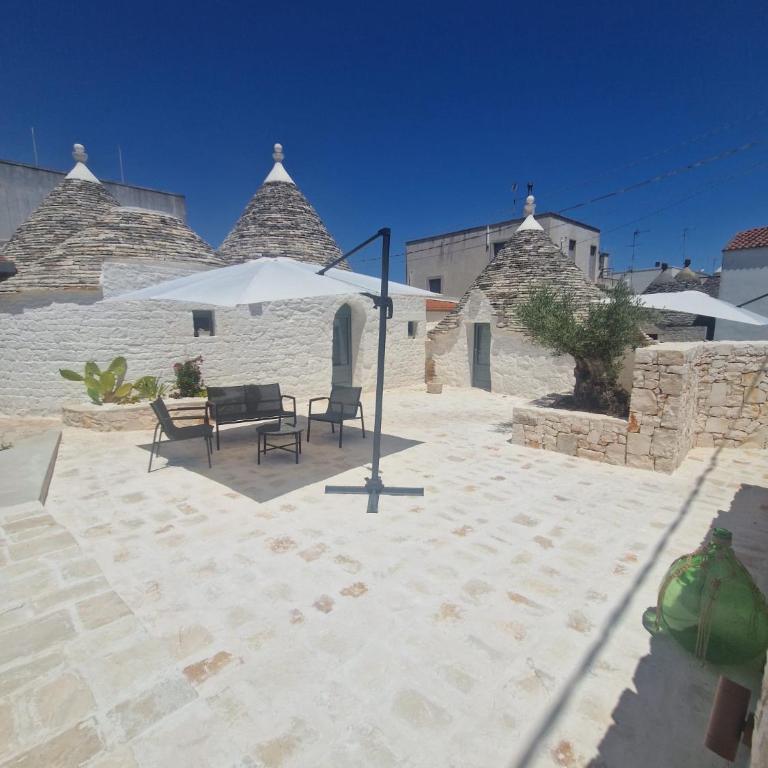 Trulli AURA BIANCA - Camera Deluxe (2 Adulti + 1 Bambino) - 1