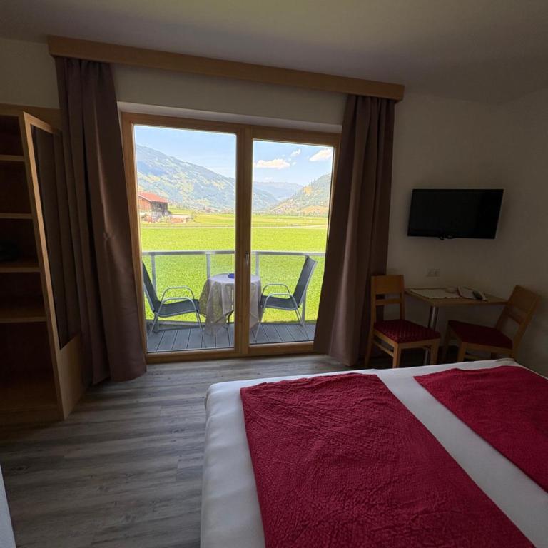 Alpen-Apart - Apartment mit 1 Schlafzimmer, Balkon und Bergblick - 7