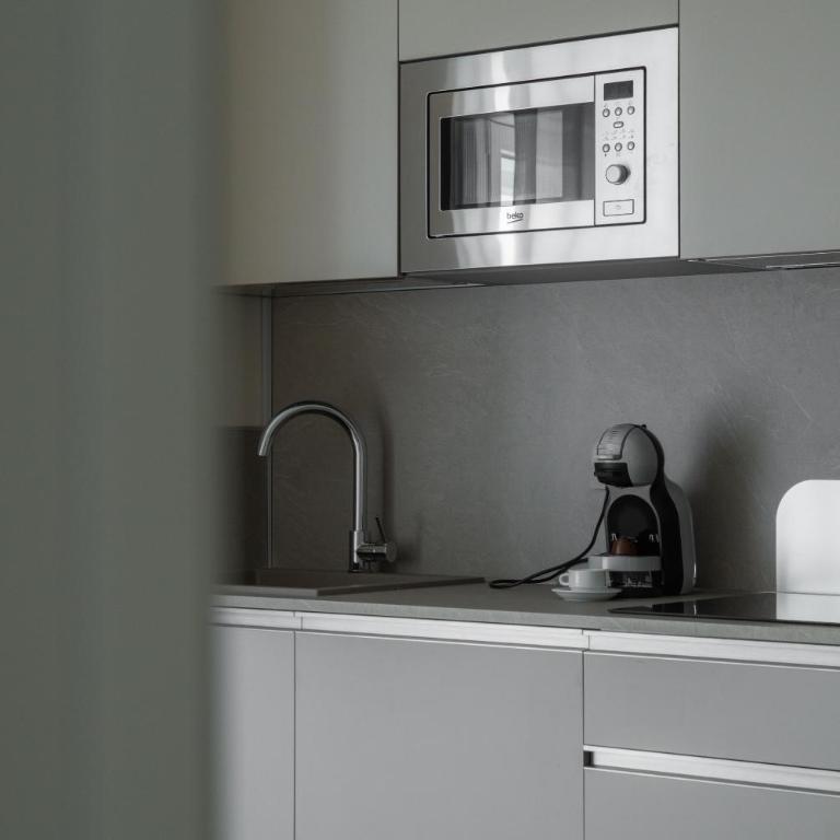 Residence La Scogliera - Appartamento Deluxe con 1 Camera da Letto e Vista Città - 12