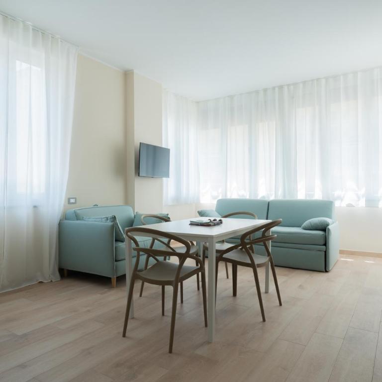 Residence La Scogliera - Camera Familiare - 9