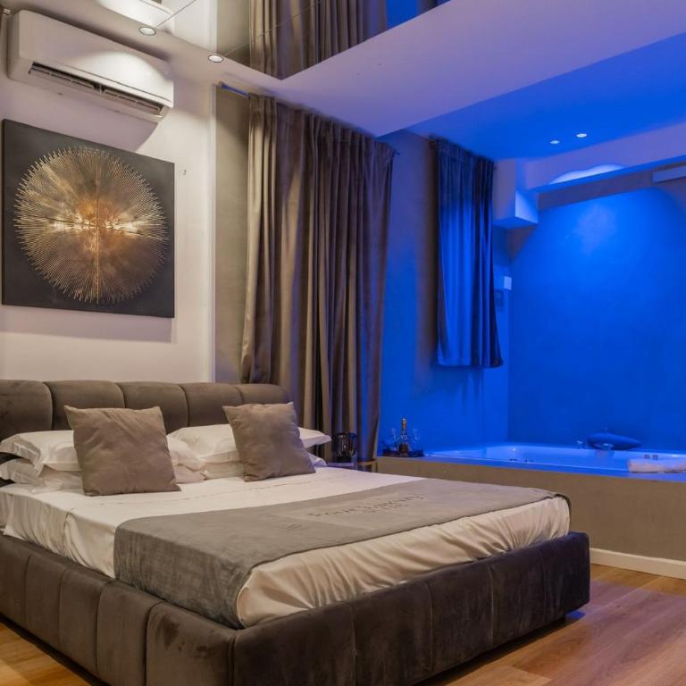 Four Luxury Suite - Zimmer mit Queensize-Bett und Whirlpool-Badewanne - 2