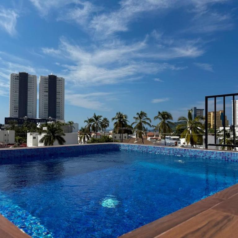Depa A unas calles de la Playa y Zona Dorada ByGPS - Apartamento - 46