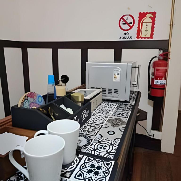Casa Fran Valparaíso | Vive un Hotel Temático - Habitación con cama extragrande y vistas al jardín - 16