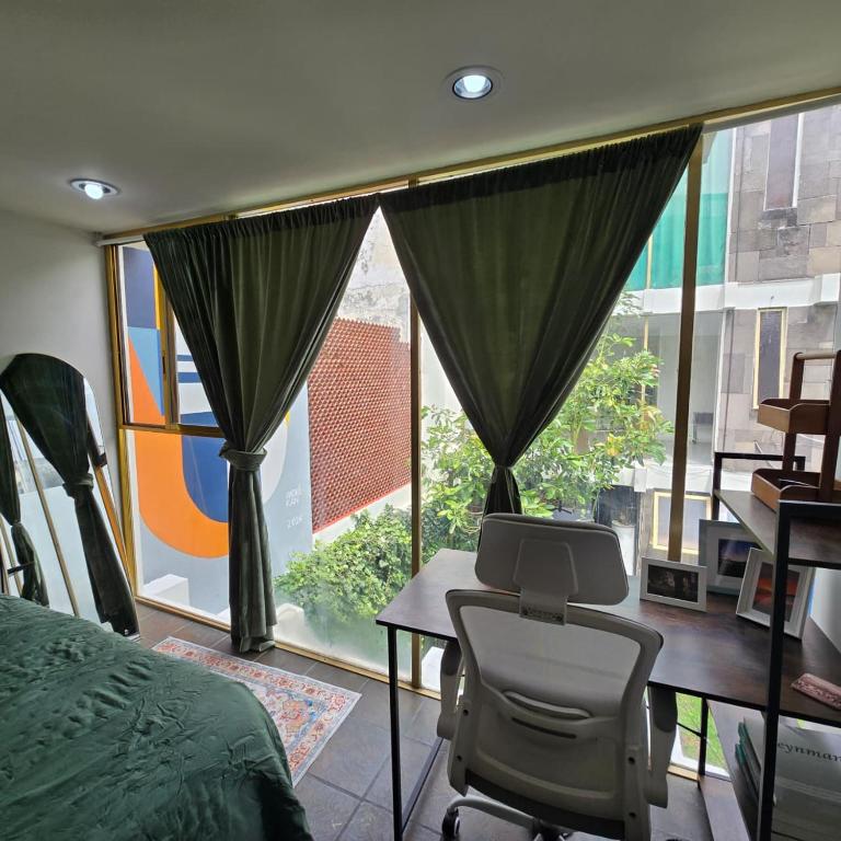Casas Murales - Habitación con cama extragrande y vistas al jardín - 6