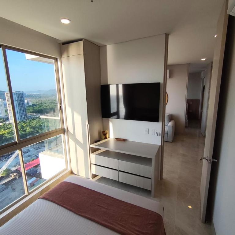 Lujo y playa en Santa Marta Vista al Mar y Sierra - Apartamento - 17