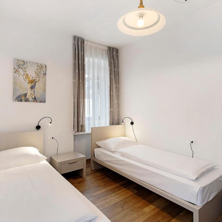Apartments Mupan St. Vigil - Appartamento Deluxe con 2 Camere da Letto e Vista Giardino - 10