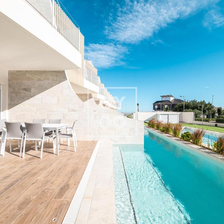 Pilar Poolside Living, luxury swim-up apt, ground-floor - by Oyoostays - Apartment mit 2 Schlafzimmern und Blick auf das Wasser - 3