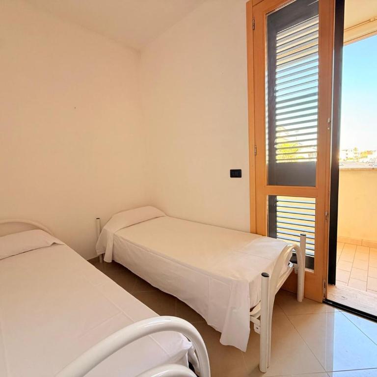 Rosmini Apartment - parcheggio-veranda - Baia Verde - Lido - by Click Salento - Two-Bedroom House - 1