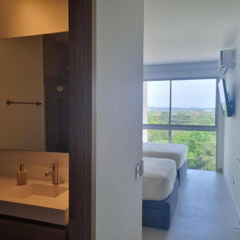 Apartamento con laguna de aguas cristalinas - Two-Bedroom Deluxe Apartment with Balcony - 20