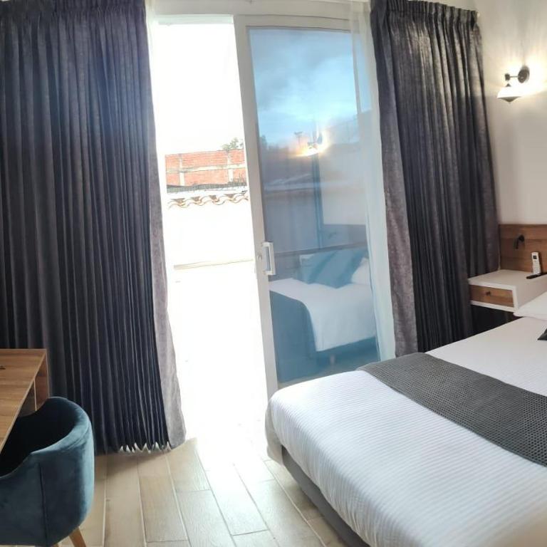 Valymar Inn International Home Hotel - Deluxe Double Room with Balcony - 5