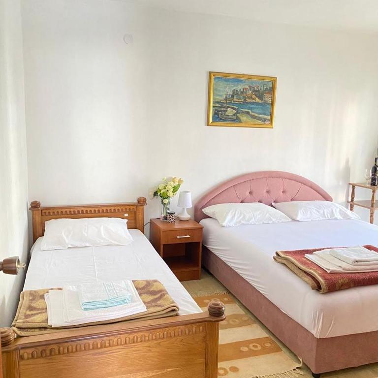 Apartmani MIR - Vierbettzimmer mit eigenem Bad - 2