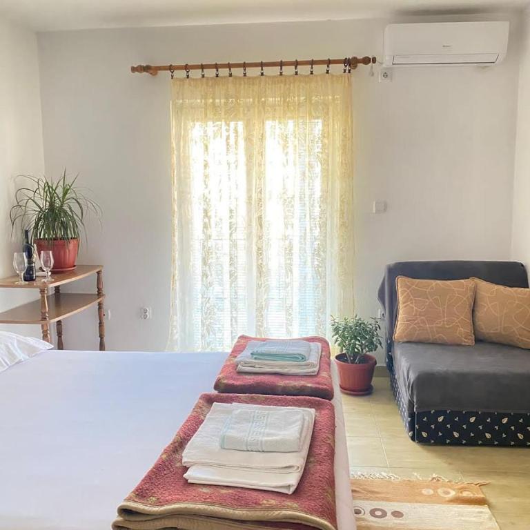 Apartmani MIR - Vierbettzimmer mit eigenem Bad - 4