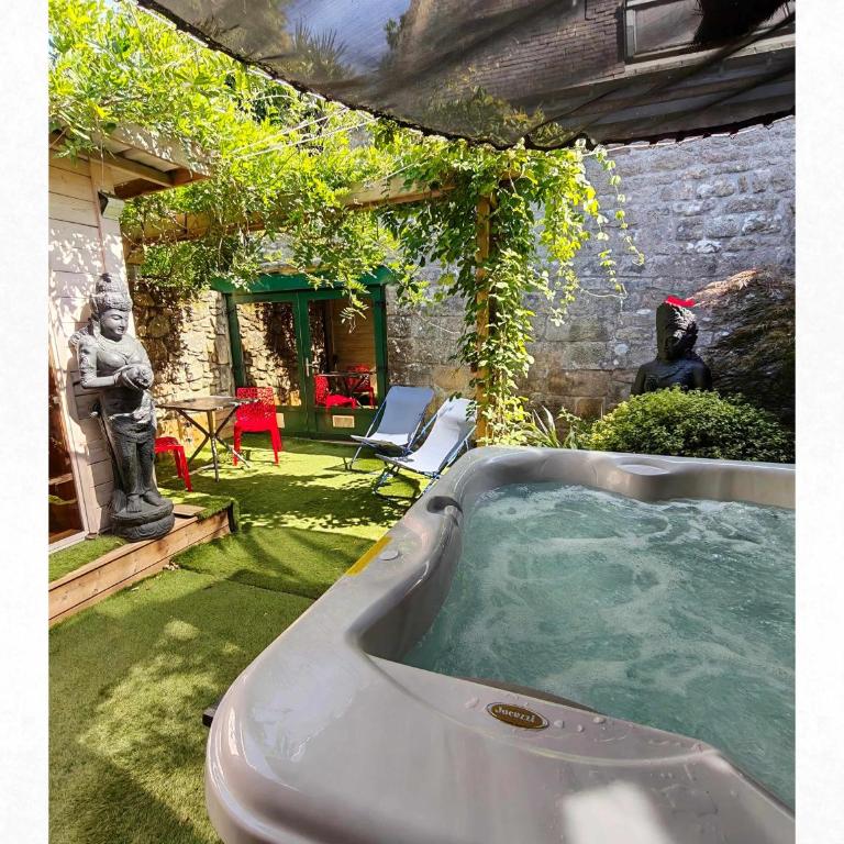 Les suites du Bouddha Bleu - Appartement - Vue sur Jardin - 19