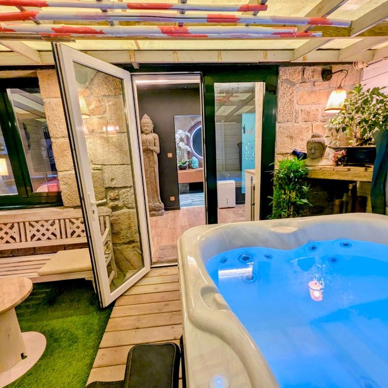 Les suites du Bouddha Bleu - Appartement Supérieur avec Sauna - 24