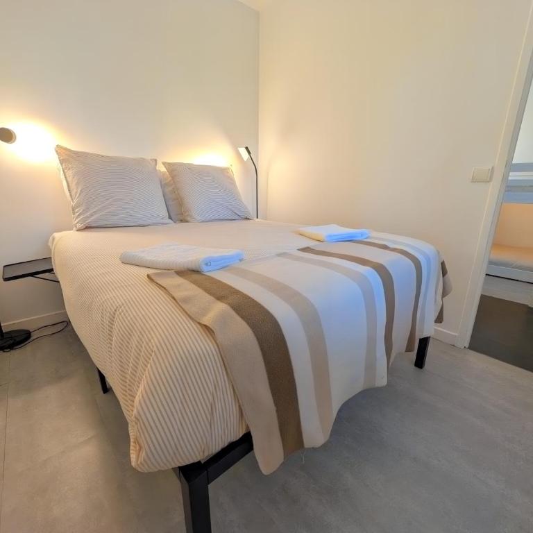 Rez-de-chaussée, parking gratuit, piscine chauffée - Appartement 2 Chambres - Vue sur Jardin - 17