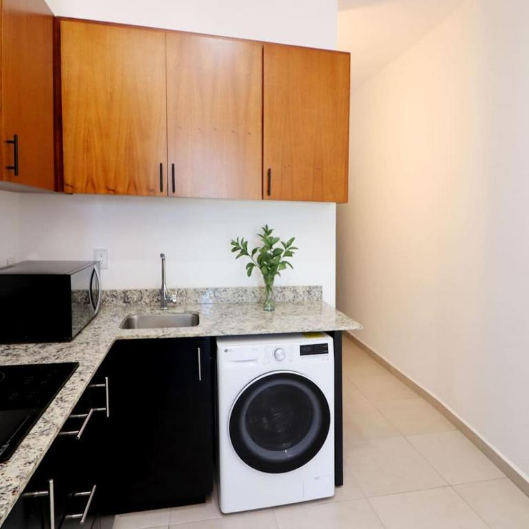Acogedor departamento con balcon y alberca en roof - Apartamento - 16