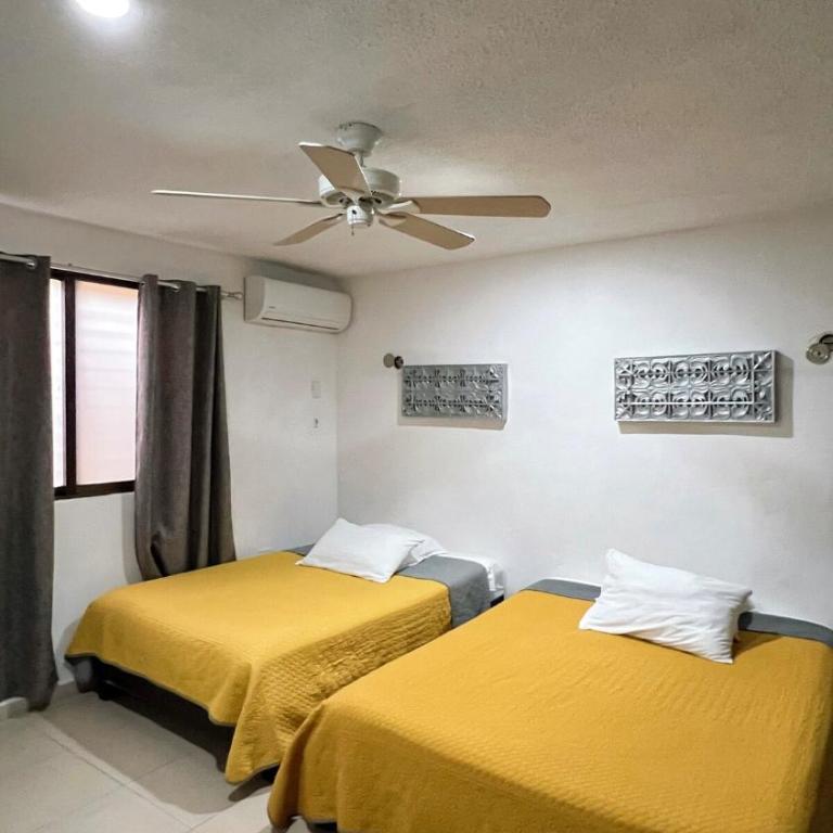 Home 365 Mérida Comodidad, amplitud total, 3 recamaras, 2 baños 5 camas ideal familias Consulado Americano - Three-Bedroom Apartment - 13