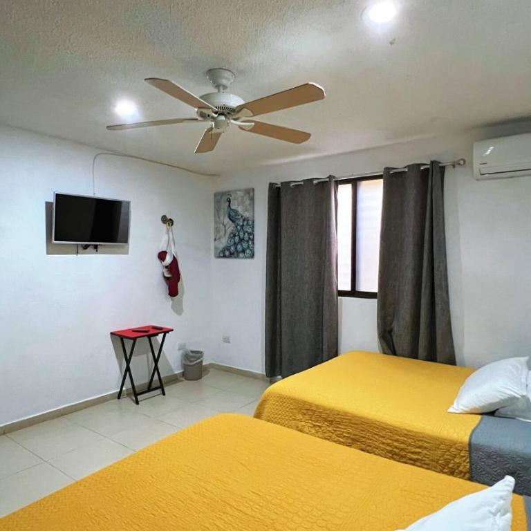 Home 365 Mérida Comodidad, amplitud total, 3 recamaras, 2 baños 5 camas ideal familias Consulado Americano - Three-Bedroom Apartment - 24