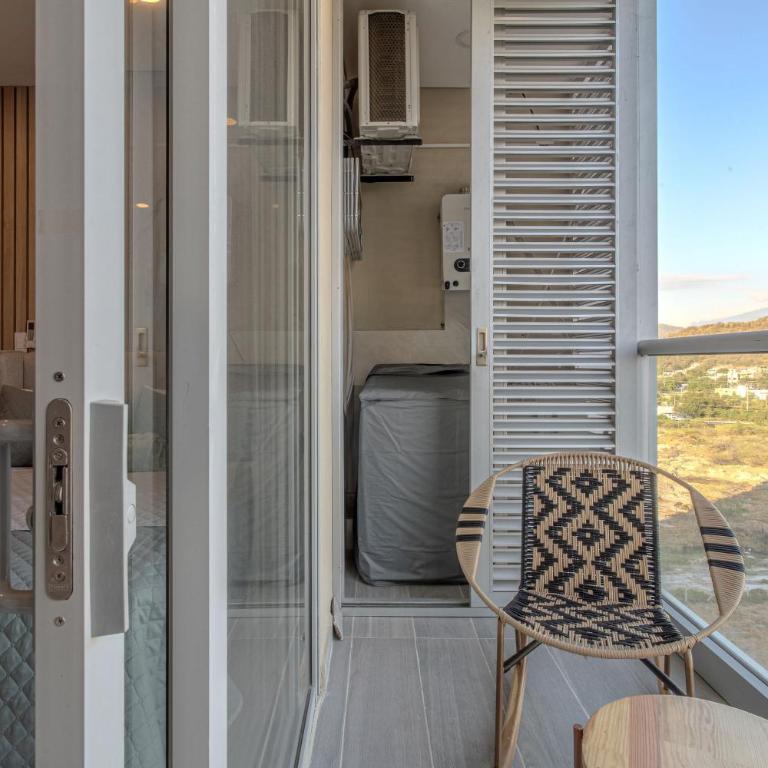 Exclusiva suite moderna con balcón cerca al mar - One-Bedroom Apartment - 17