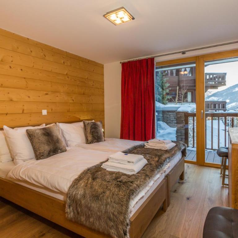 Chalet Les Rahâs by Mrs Miggins - Deluxe drei-Zimmer-Wohnung mit Jacuzzi - 1
