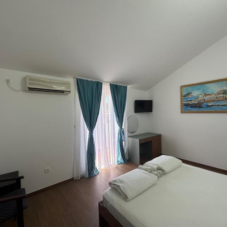 Porta Volta Apartments - Deluxe Doppelzimmer mit Balkon - 4