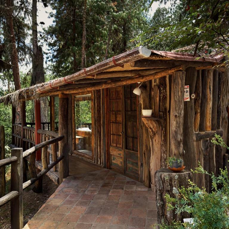 Cabañas Campestres Yugos - Habitación con cama grande y bañera de hidromasaje - 1