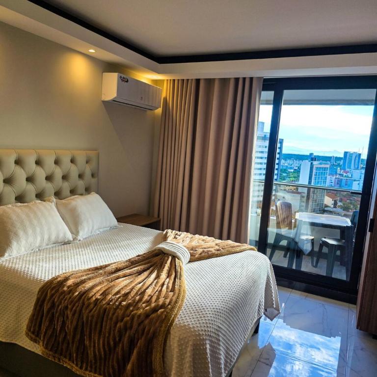Balcon piso 13 - Lujo - Piscina - Gym - Home Office - One-Bedroom Apartment - 2