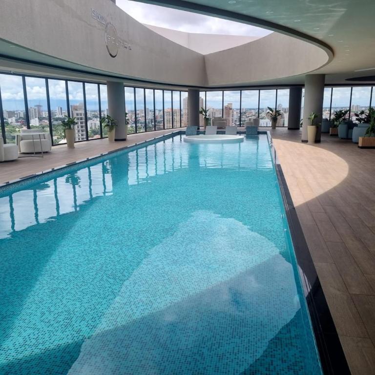 Balcon piso 13 - Lujo - Piscina - Gym - Home Office - One-Bedroom Apartment - 3