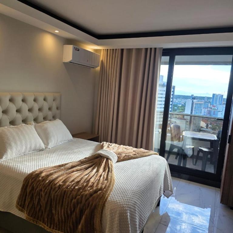 Balcon piso 13 - Lujo - Piscina - Gym - Home Office - One-Bedroom Apartment - 5