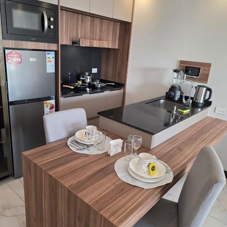 Balcon piso 13 - Lujo - Piscina - Gym - Home Office - One-Bedroom Apartment - 12
