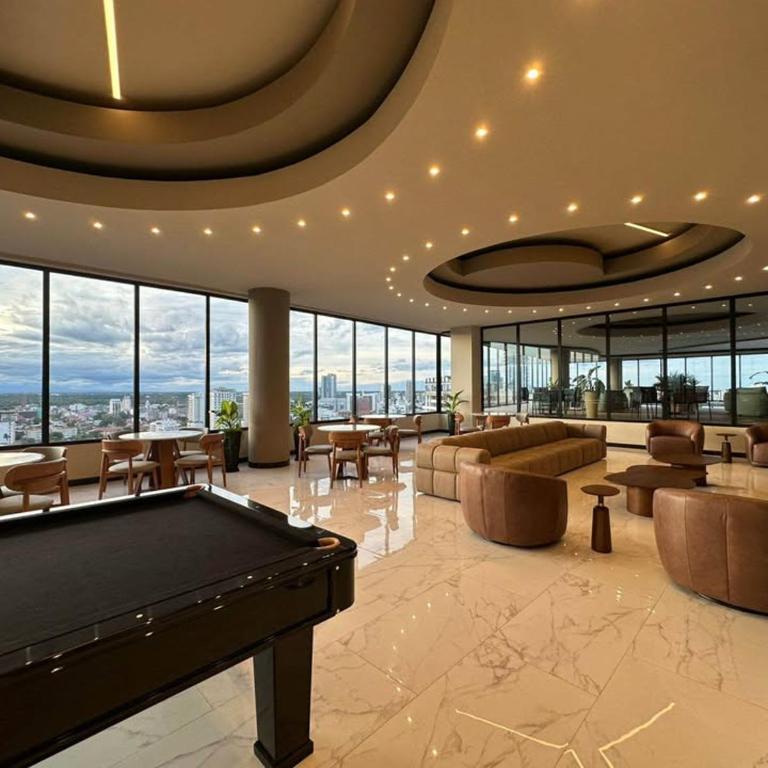 Balcon piso 13 - Lujo - Piscina - Gym - Home Office - One-Bedroom Apartment - 18