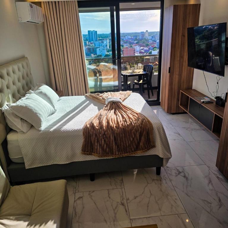 Balcon piso 13 - Lujo - Piscina - Gym - Home Office - One-Bedroom Apartment - 22