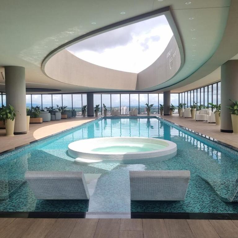 Balcon piso 13 - Lujo - Piscina - Gym - Home Office - One-Bedroom Apartment - 28