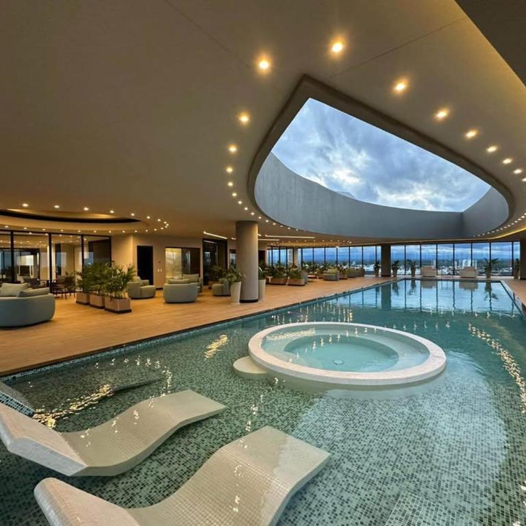 Balcon piso 13 - Lujo - Piscina - Gym - Home Office - One-Bedroom Apartment - 37