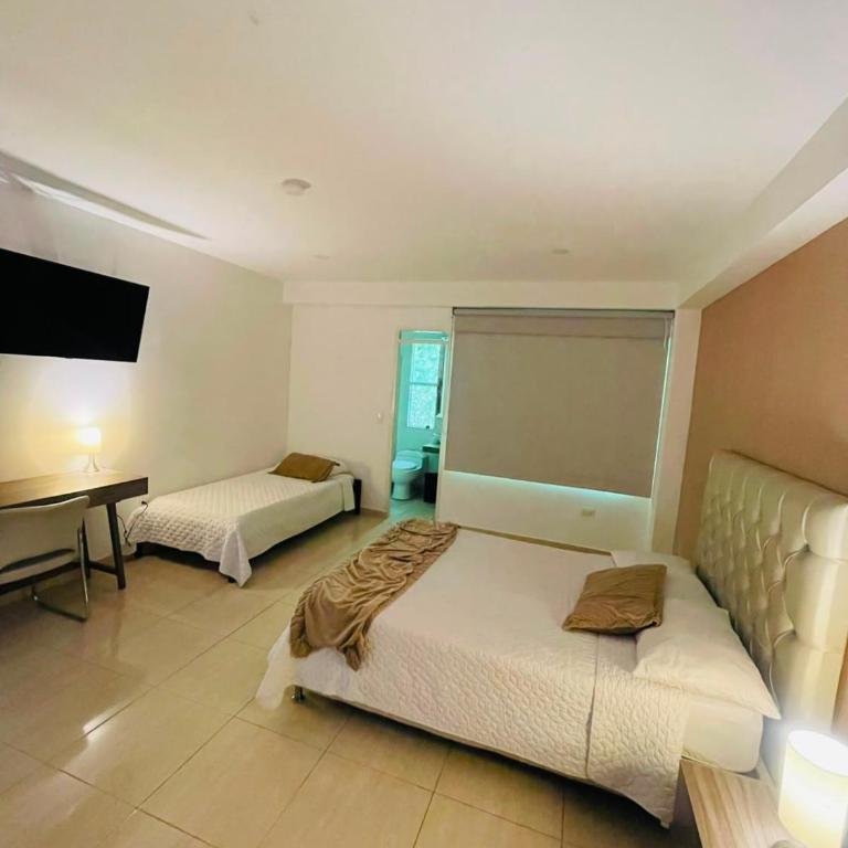 Hotel Mall Roma - Habitación Familiar Deluxe - 5