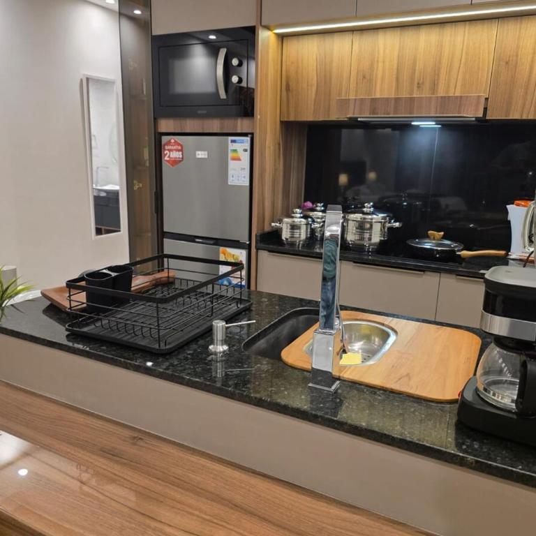 Balcon piso 16 - Escritorio - Piscina - Gym - One-Bedroom Apartment - 3