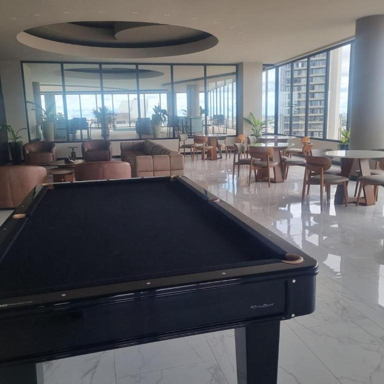 Balcon piso 16 - Escritorio - Piscina - Gym - One-Bedroom Apartment - 15